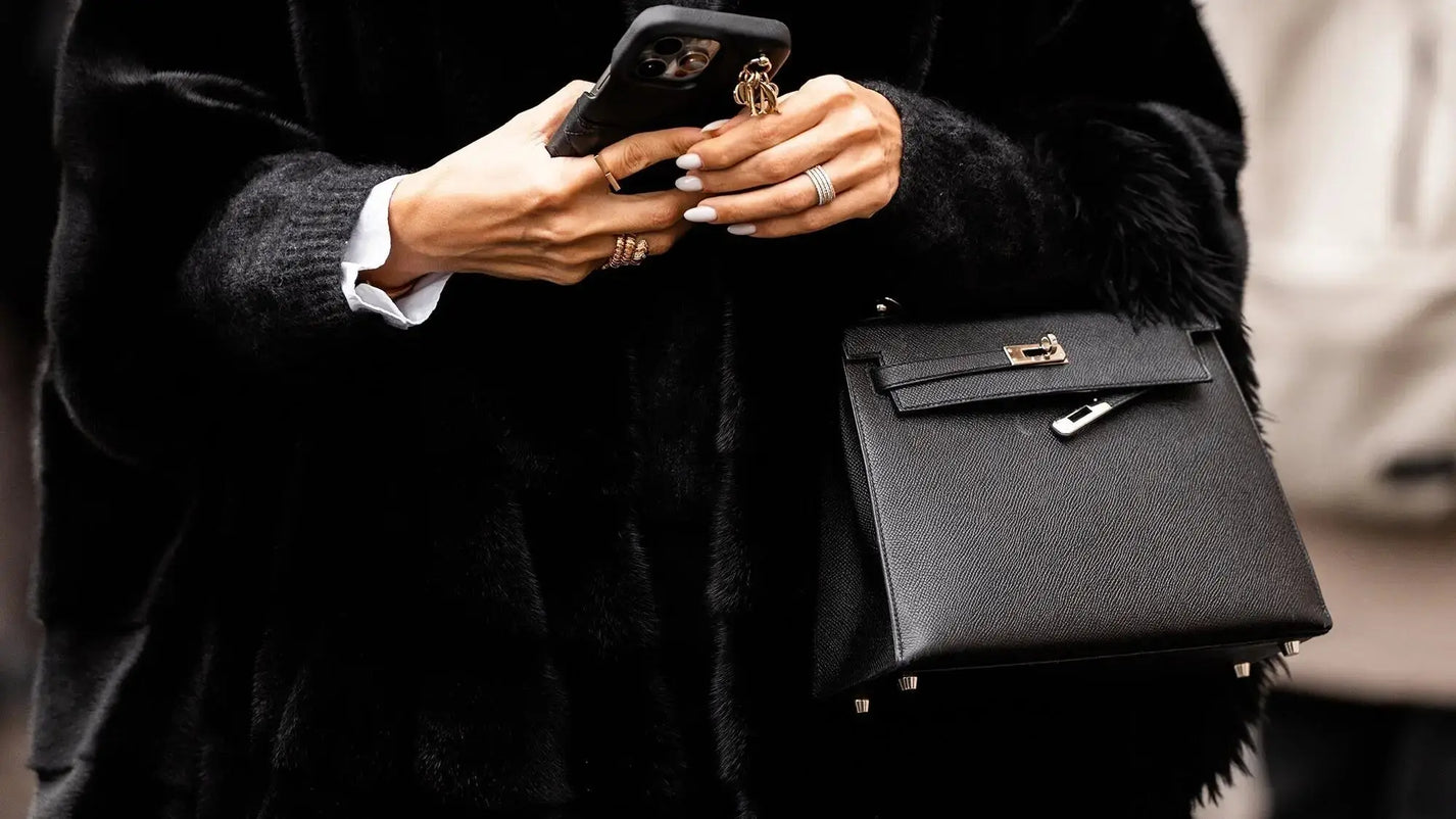 Black textured leather Hermes Kelly bag with gold-tone hardware