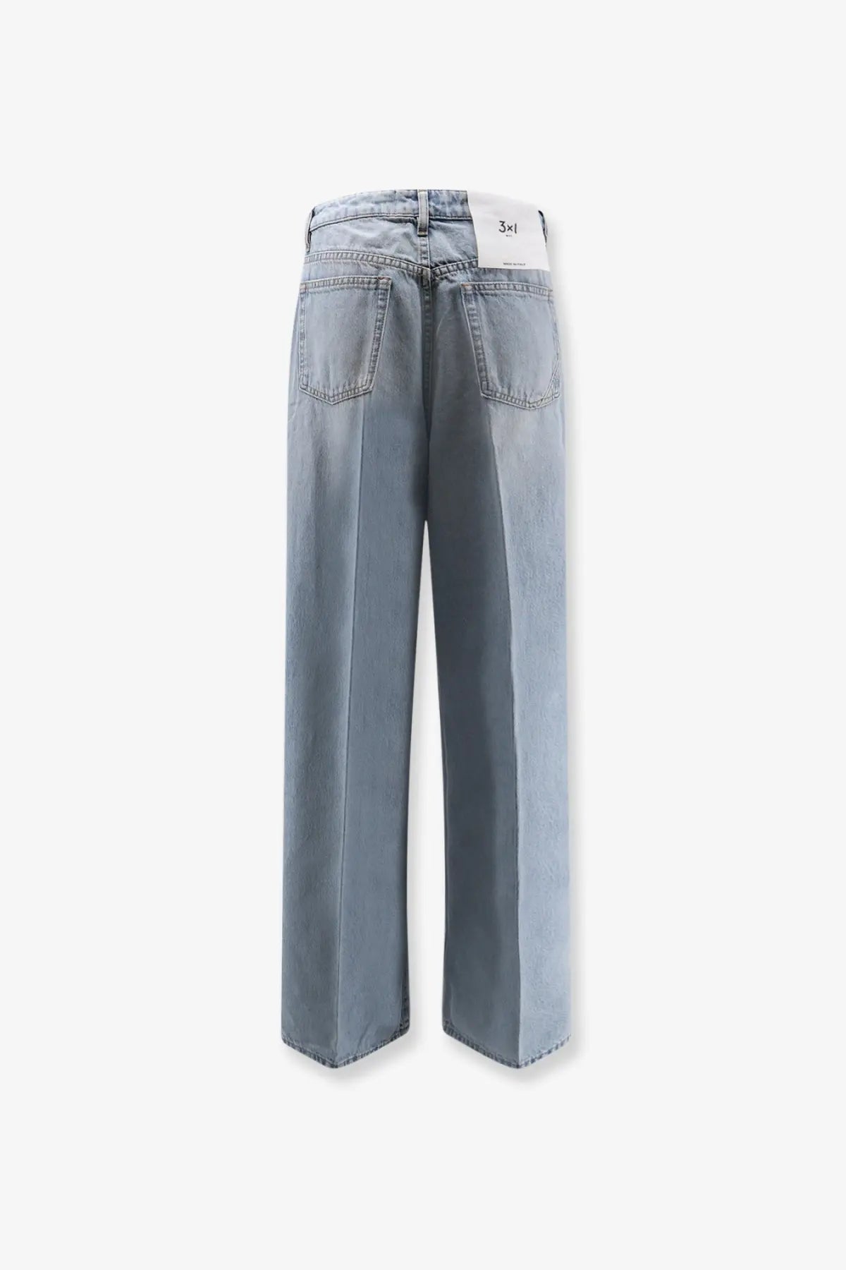 Light blue wide-leg denim jeans with a clean modern cut and subtle fading from 3x1 women’s Flip Blue Denim Jeans Blue collection