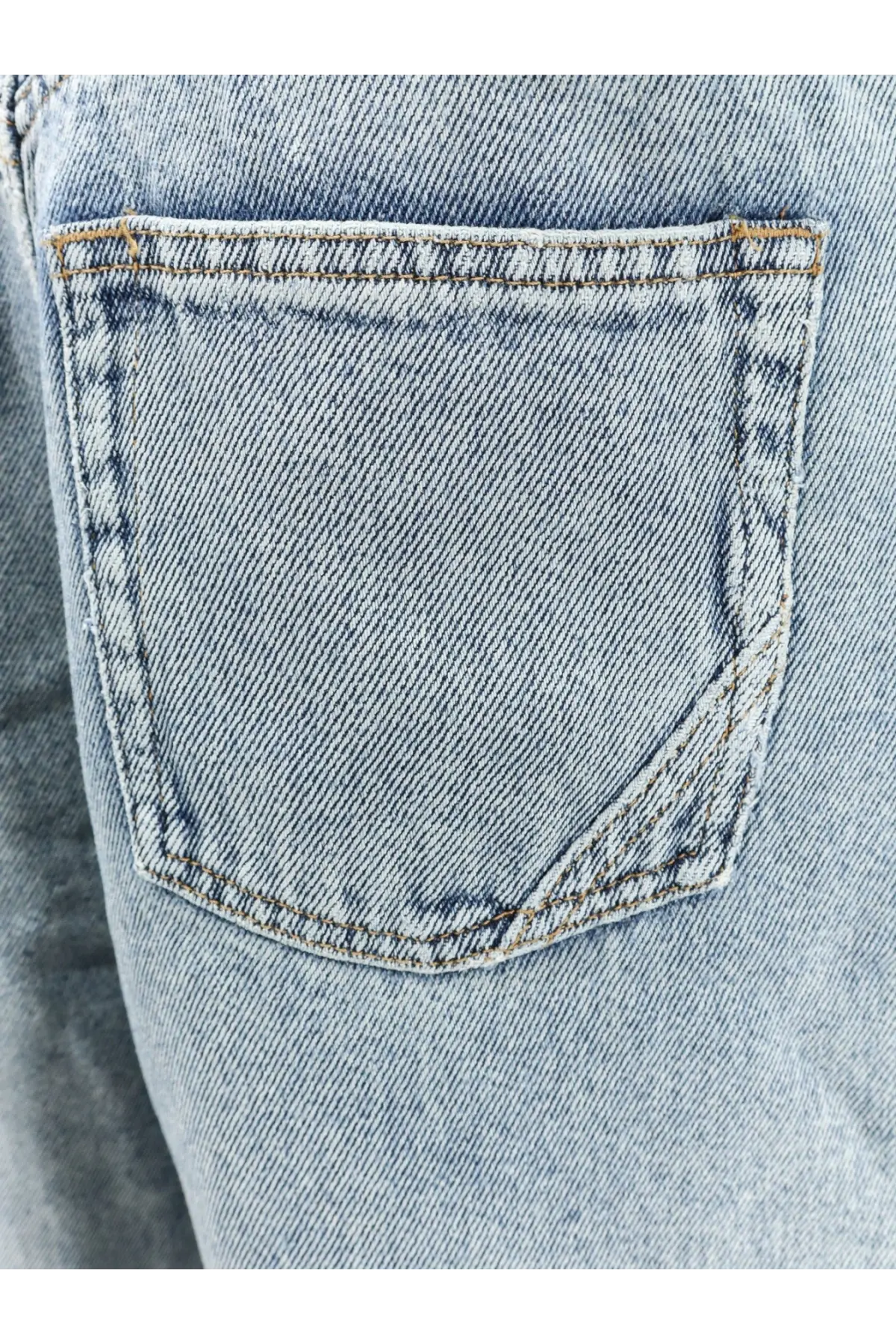Back side of 3x1 women’s skater blue denim bermuda shorts with light-wash denim pocket and faded stitching detail