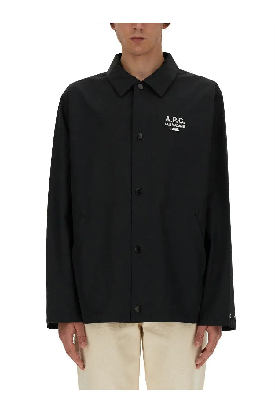 A.P.C. men’s blouson Regis in black features a sleek design ideal for casual wear and lightweight protection