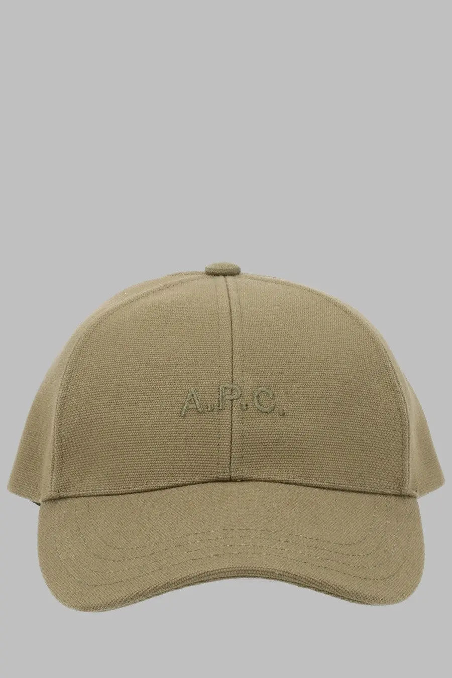 Tan cotton baseball cap with subtle embroidered logo on front from apc mens cappello da baseball charlie green