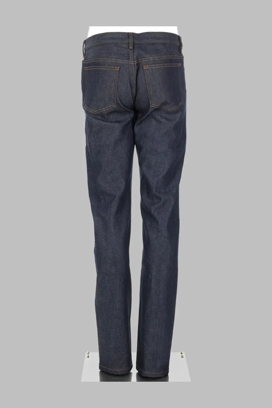 A.P.C men’s dark indigo denim jeans with straight-leg cut and classic back pockets shown from the back side