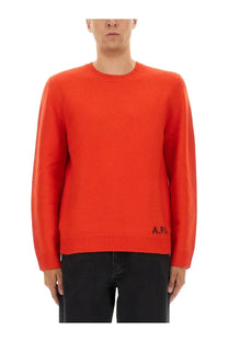 A.P.C men’s bright orange crewneck sweater with ribbed cuffs and hem featuring a small black logo embroidery
