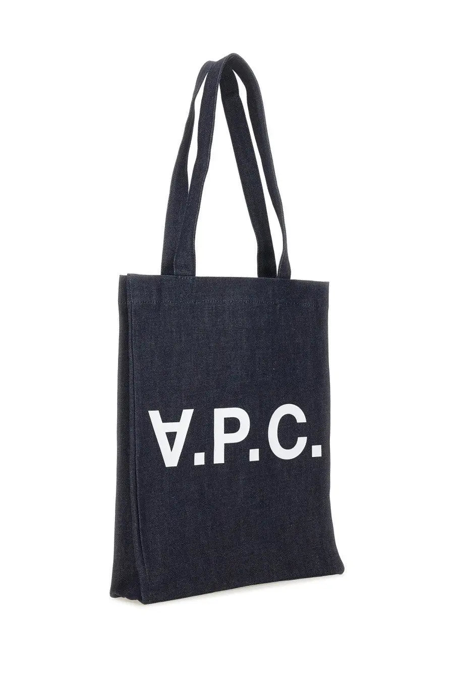 Black canvas tote bag with white apc lettering featured in apc womens borsa tote in denim blue product image