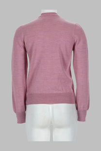 A soft pink long-sleeved knit sweater with ribbed hem and cuffs shown as apc women’s cardigan in lana blue