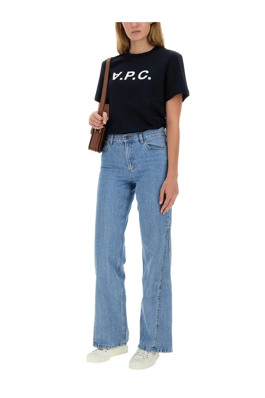 Black v.p.c. displayed with a.p.c women’s con blue shirt highlighting contrast in fabric and color details