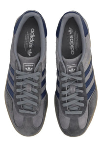 Adidas men’s gazelle indoor sneaker grey in gray suede with navy blue stripes and matching heel accents