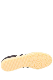 Adidas men’s Samba OG sneaker black leather with white stripes and pale yellow rubber sole for casual wear