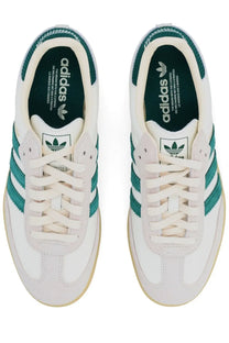 Adidas men’s sneaker samba white featuring white leather upper teal stripes and gum rubber sole