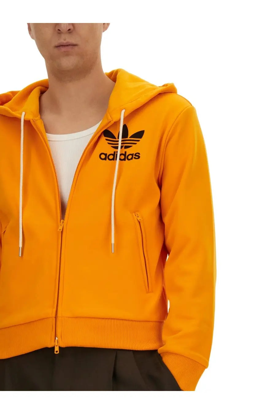Vibrant orange adidas Originals by Wales Bonner men’s hooded track sweatshirt with black trefoil logo and white drawstrings