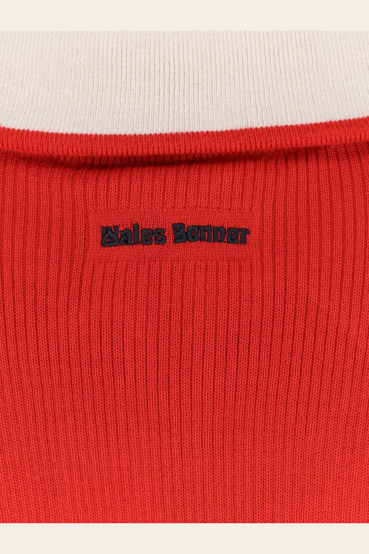 Bright red ribbed knit top with black embroidered bales banner logo at neckline from adidas Originals by Wales Bonner