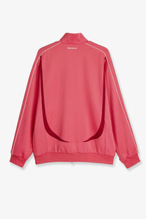 A vibrant pink adidas originals by wales bonner unisex track jacket in cotton elastane with white piping and back cutout detail