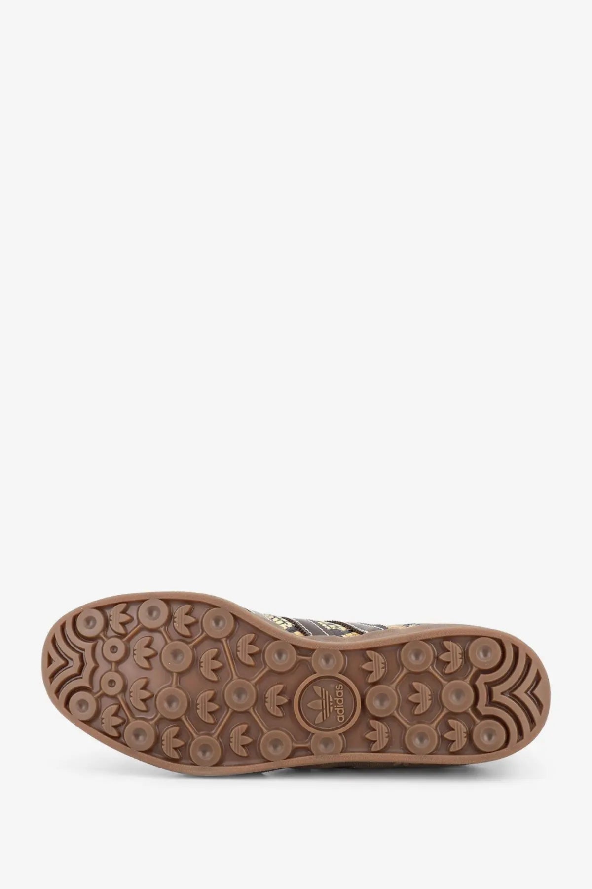 Brown rubber sole with repeating adidas logo patterns and central emblem on adidas originals by wales bonner grey snake leather sneakers