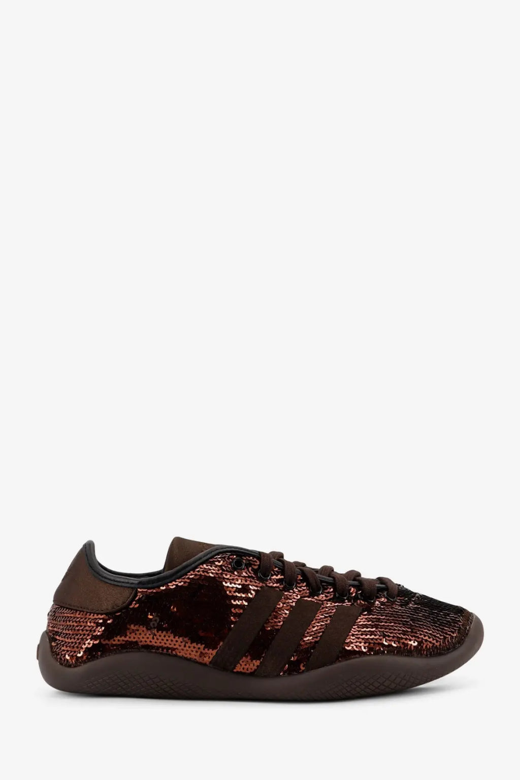 A rose gold sequined adidas Originals by Wales Bonner women’s nylon sneaker with black stripes and laces in brown