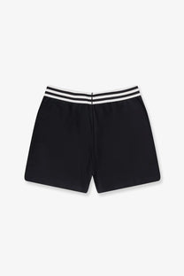 Adidas originals x willy chavarria men’s black cotton bermuda shorts with white striped waistband front view