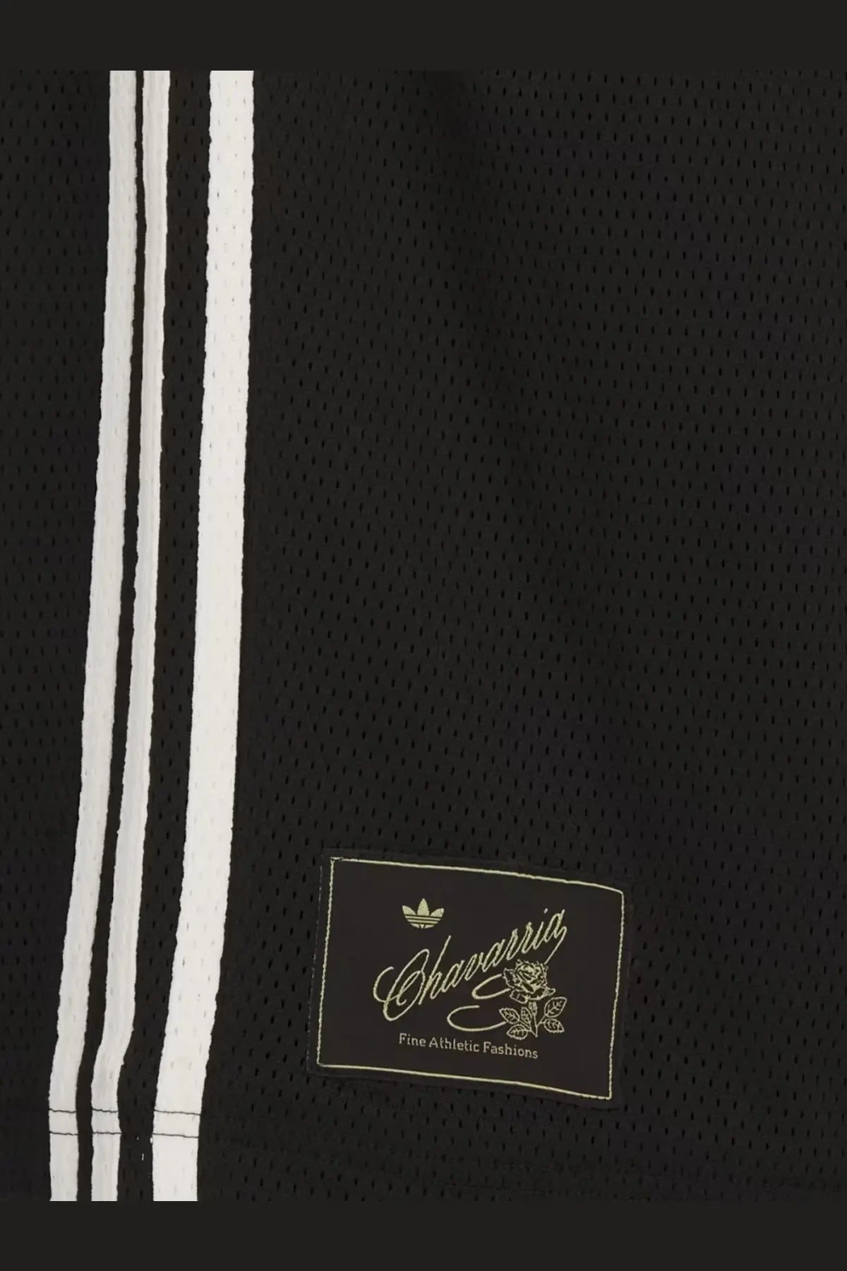 Black mesh basketball jersey with white vertical stripes and gold trim featuring chavarria label by adidas originals x willy chavarria