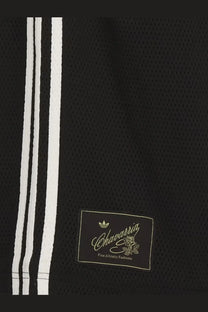 Black mesh basketball jersey with white vertical stripes and gold trim featuring chavarria label by adidas originals x willy chavarria