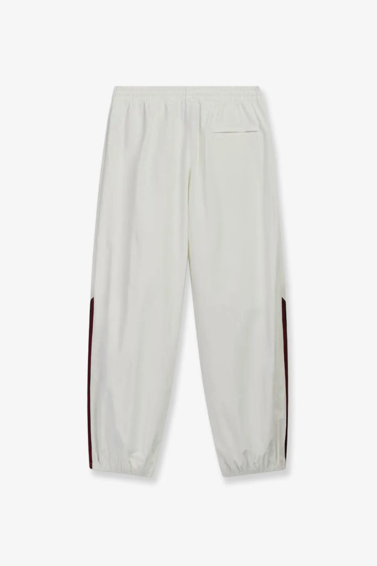 Adidas Originals x Willy Chavarria men’s cream nylon joggers with slim tapered legs and dark red side stripes