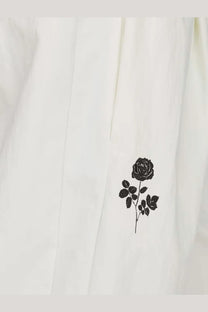 Adidas originals x willy chavarria men’s white recycled nylon trousers with delicate black rose embroidery on off-white fabric
