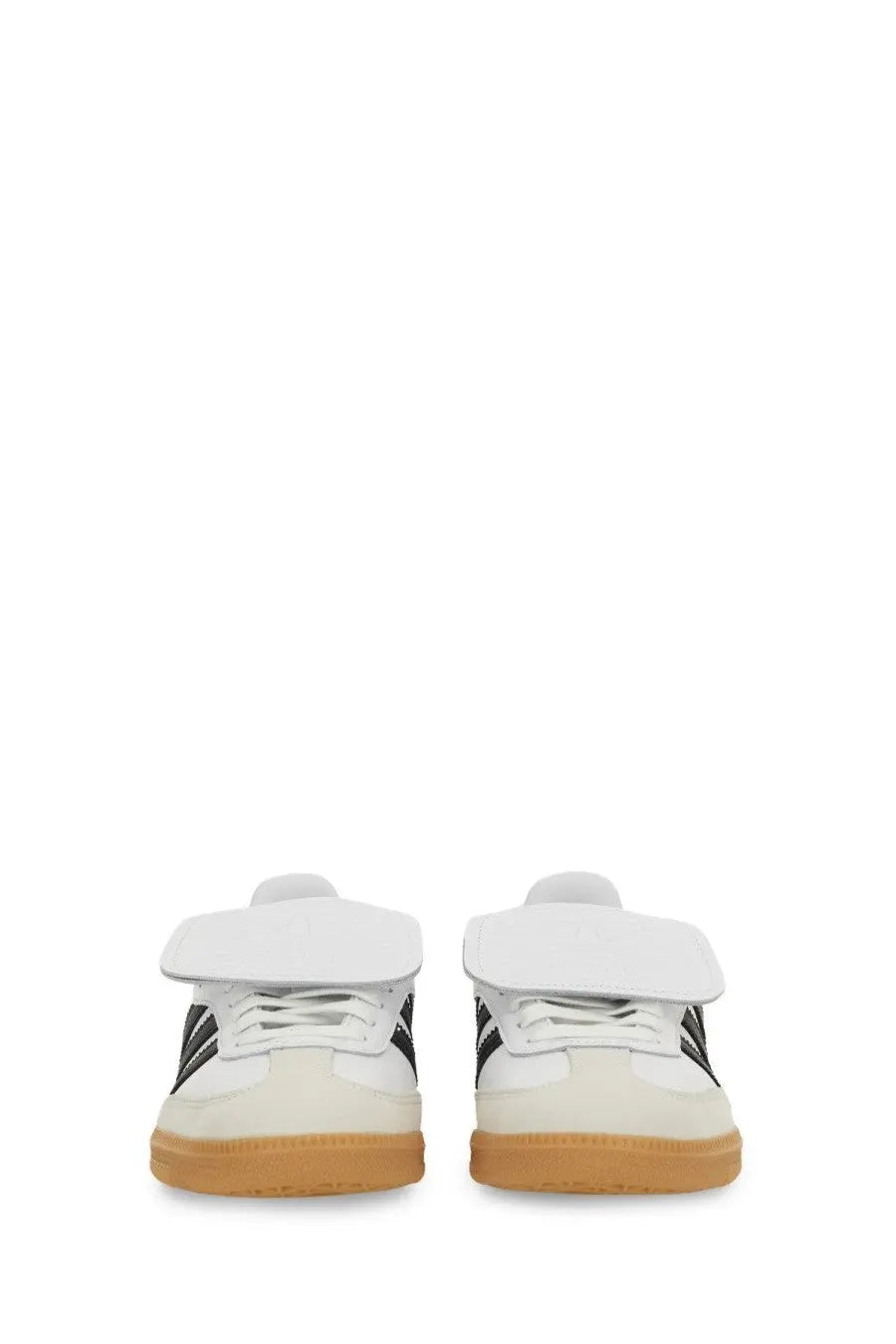 White adidas unisex samba sneaker with black stripes and tan rubber sole multicolor design