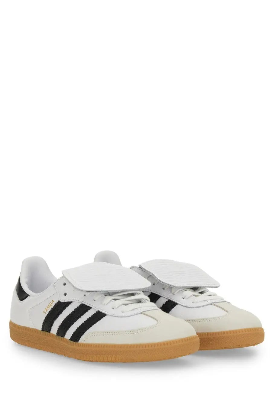 White adidas unisex samba sneaker with black stripes and tan rubber sole in multicolor design