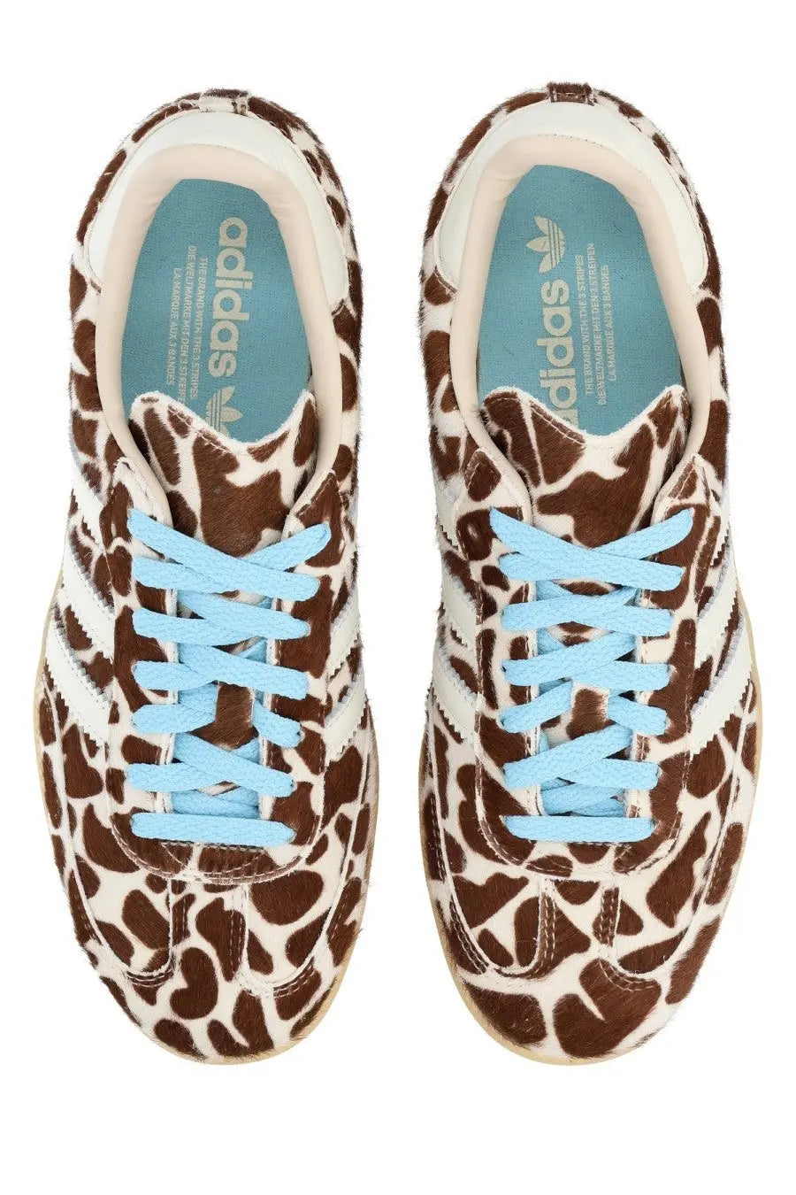 Adidas unisex sneaker samba pattern with brown and white giraffe print and light blue laces