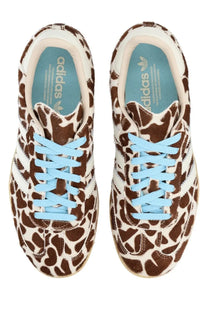 Adidas unisex sneaker samba pattern with brown and white giraffe print and light blue laces