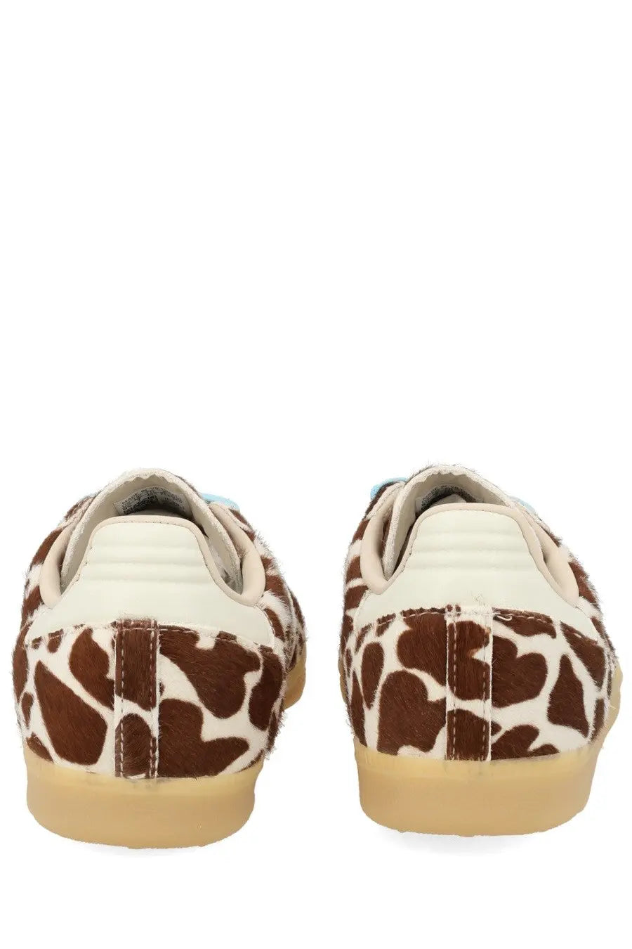 Adidas unisex sneaker samba pattern featuring brown and white giraffe-print suede with beige rubber sole