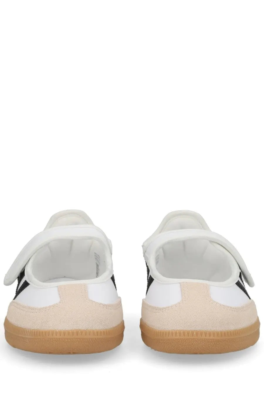Adidas women’s samba jane sneaker in white featuring white and black suede upper with tan rubber sole