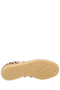 Adidas women’s Samba OG sneaker leopard-print suede with tan rubber sole and white accents visible from the front view