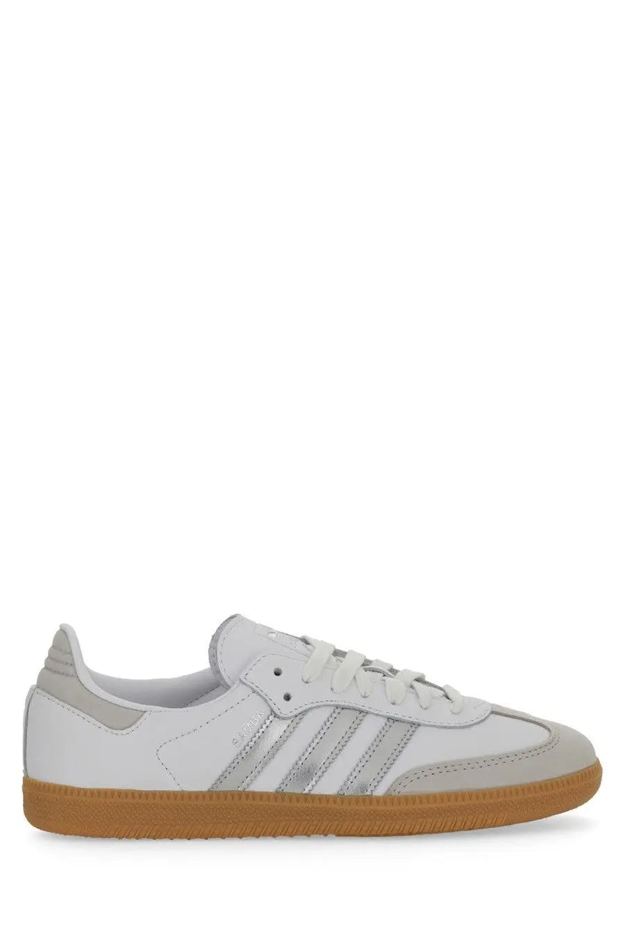 Adidas women’s sneaker samba white with white leather, silver stripes, and gum rubber sole in front view