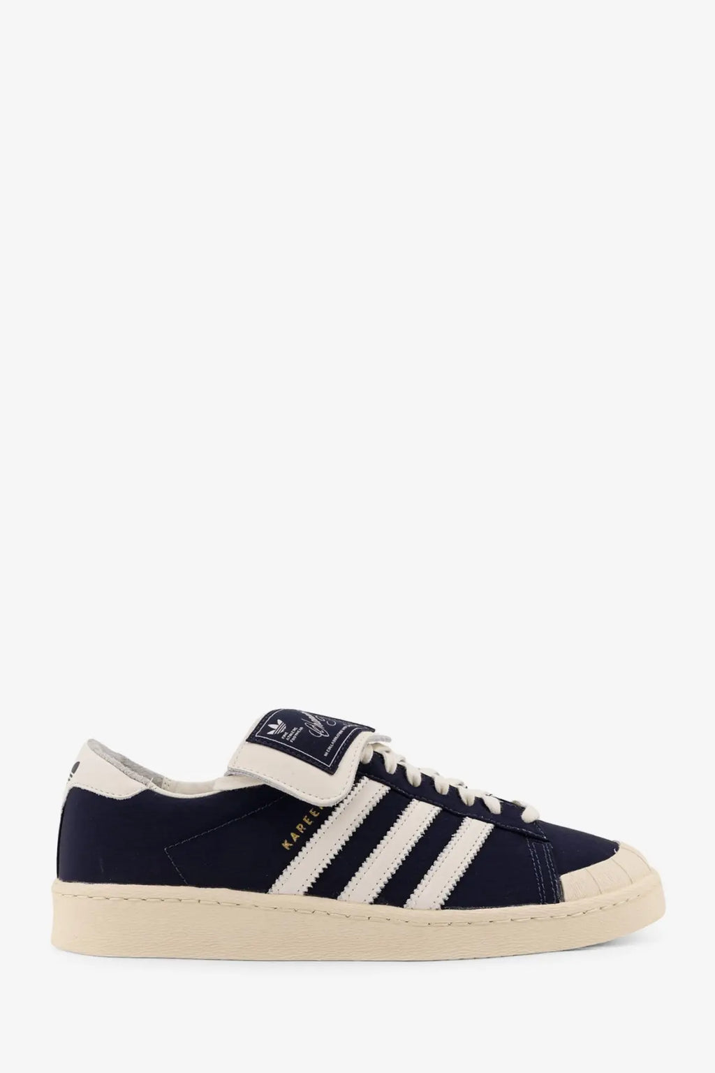 Navy blue Adidas X Willy Chavarria Jabbar Low sneakers with white stripes