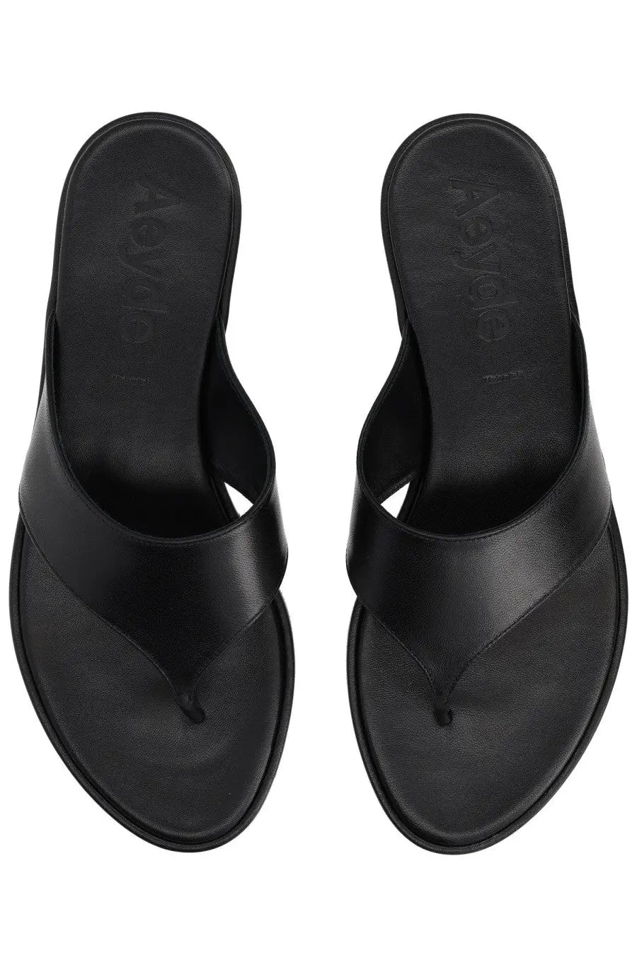 Black leather flip-flops with minimalist design and aleya embossed insole from Aeyde women’s thong sandal black