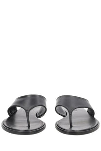 Aeyde women’s black leather thong sandal featuring a minimalist design perfect for casual wear