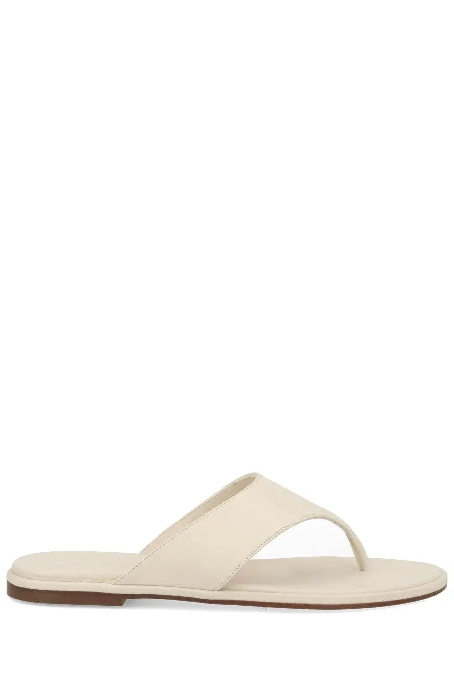 Cream-colored leather thong sandal with minimalist design and brown rubber sole by aeyde for women