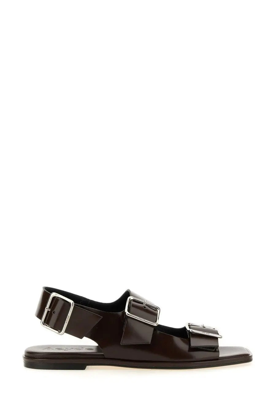 Dark brown patent leather aeyde women’s sandal with three silver buckle straps