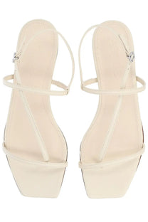 Aeyde women’s thong sandal ella white in cream color with thin straps and square heel minimalist design