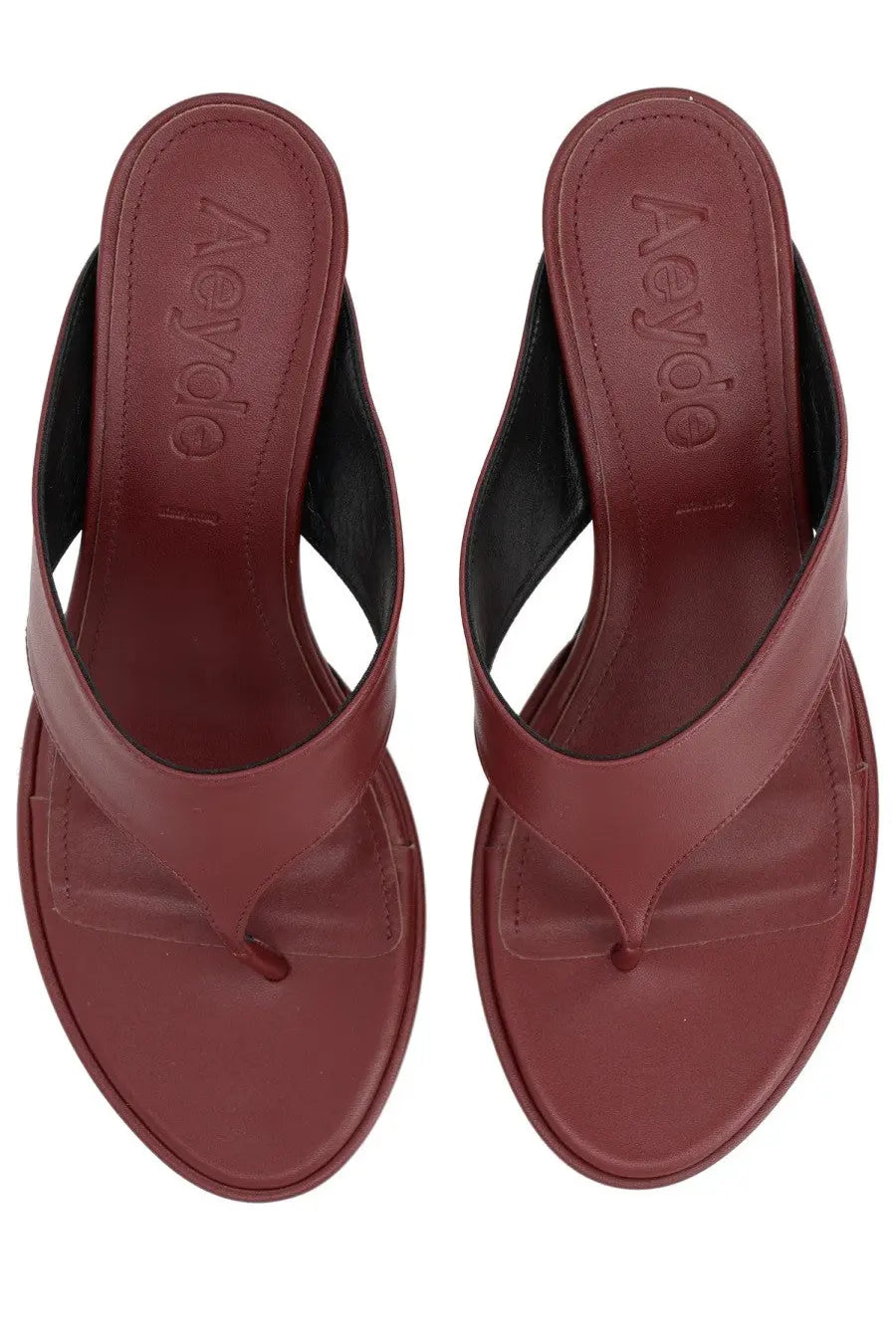 Aeyde women’s burgundy leather thong sandal with sleek minimalist design and black inner lining