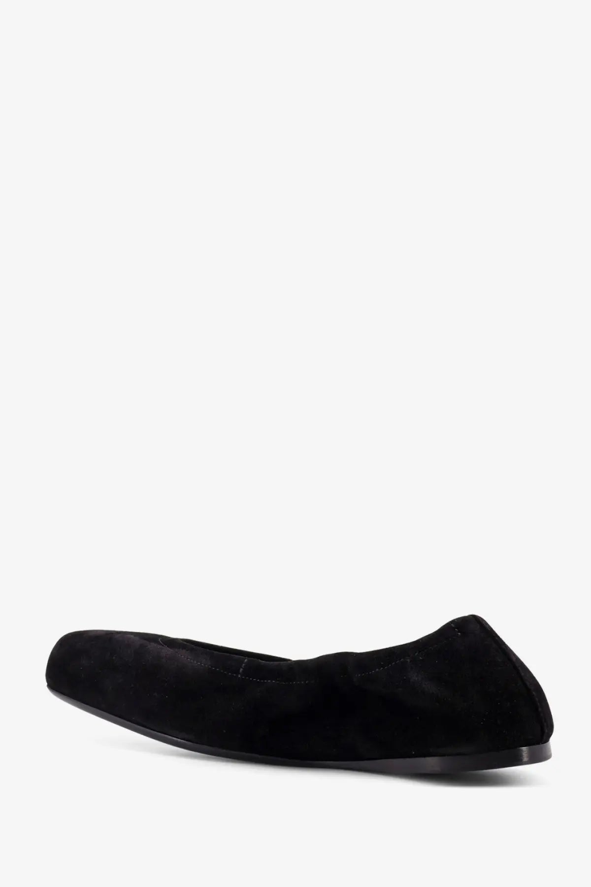 Alaïa women’s black suede ballet flats with a sleek minimalist design and low-profile sole