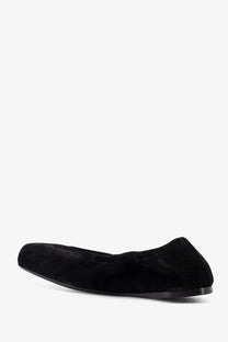 Alaïa women’s black suede ballet flats with a sleek minimalist design and low-profile sole