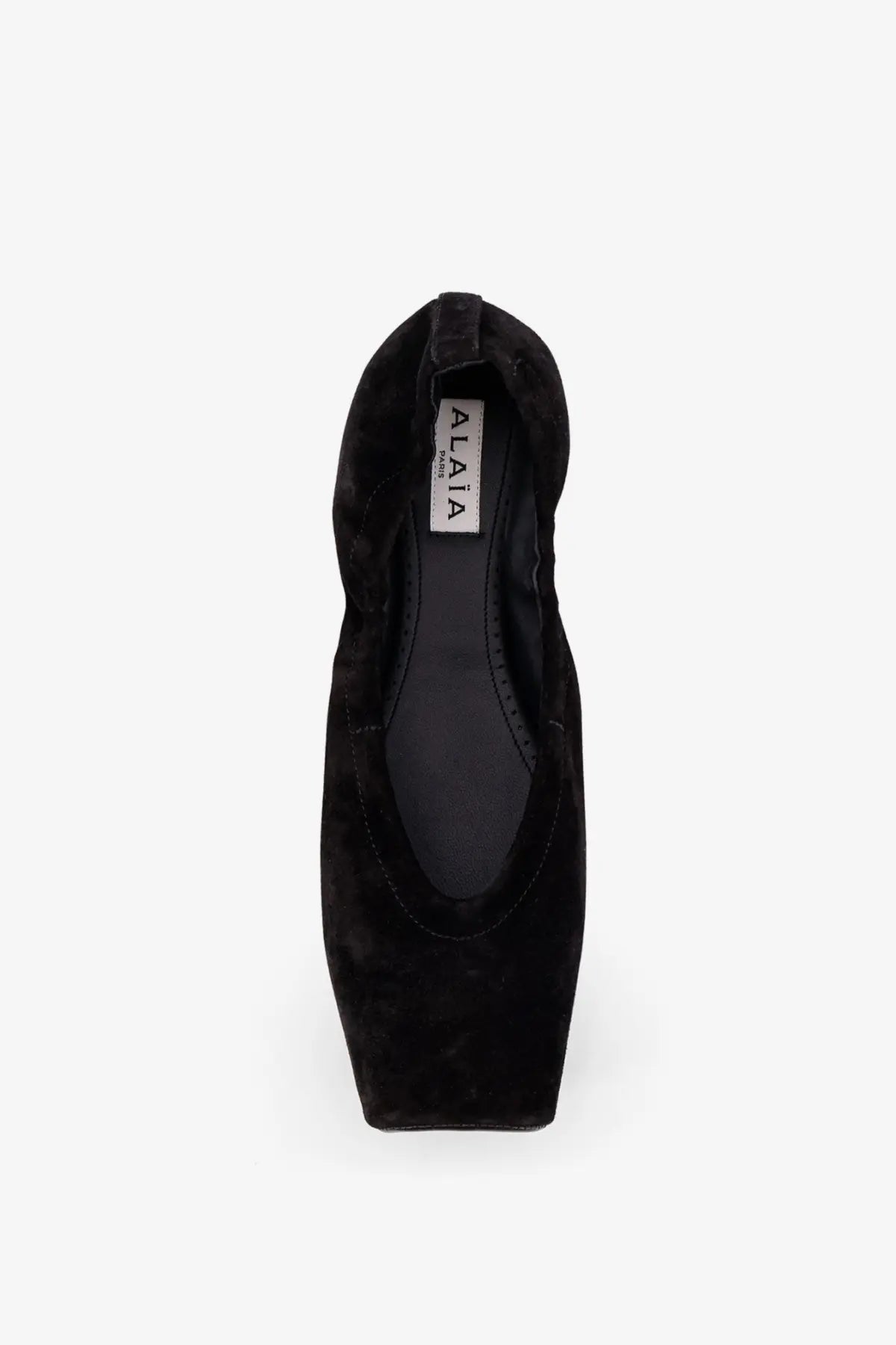 Alaïa women’s black suede ballet flats with square heel and minimalist design for elegant everyday wear