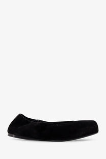 Alaïa women’s black ballet flats with sleek minimalist design soft plush black velvet suede ballerinas