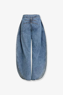 Back of Alaïa women’s blue light-wash denim wide-leg jeans with stitched crisscross detailing on the back design