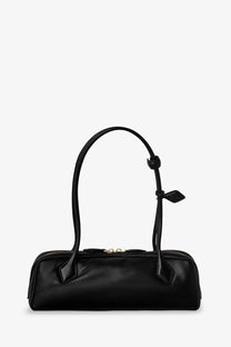 Alaïa women’s le teckel black leather handbag with curved top handles and gold-tone zipper hardware