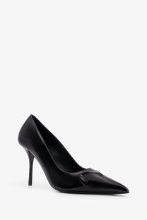Alaïa women’s patent leather decolleté black pointed-toe pump with slender stiletto heel and glossy finish