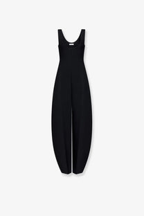 Alaïa women’s black sleeveless jumpsuit made of virgin wool with wide-leg tapered pants and minimalist design