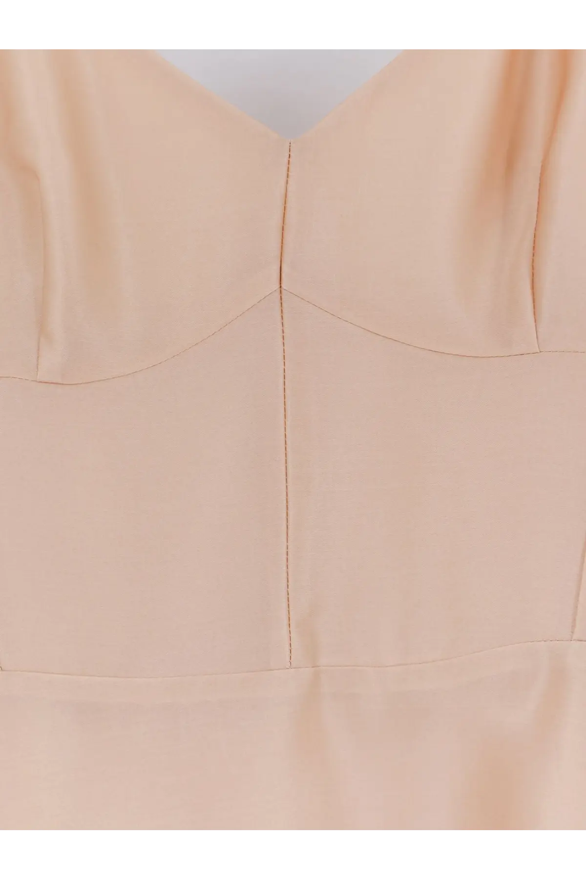 Alberta Ferretti women’s silk dress in soft peach beige with smooth flowing fabric and subtle seam detailing