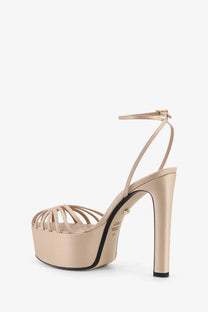 Beige satin platform sandal with high stiletto heel and thin crisscross straps from alevi women’s eva satin sandals satin skin