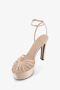 Beige alevi women’s eva satin sandals with high heel and thin satin straps forming an intricate pattern across foot