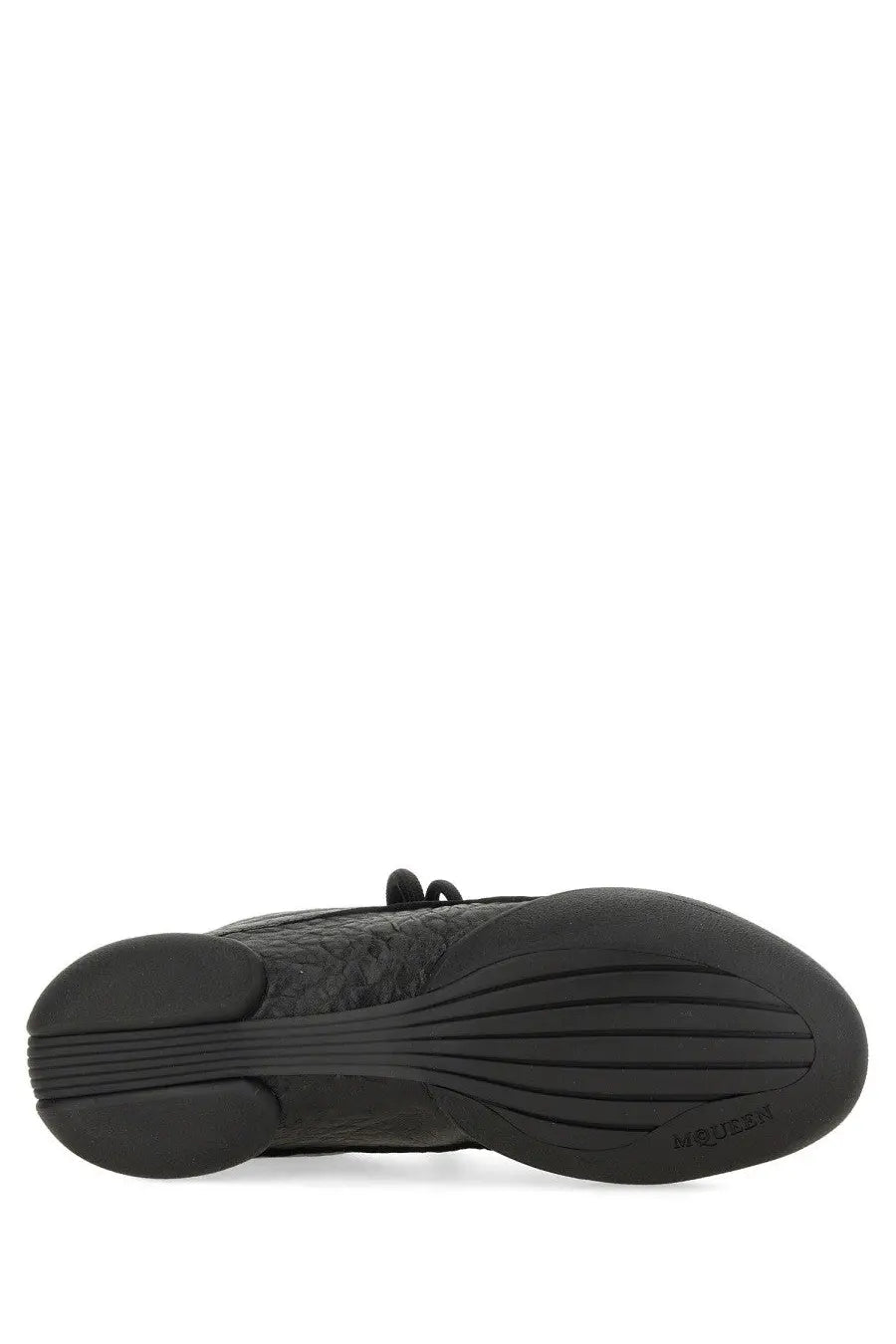 Alexander McQueen men’s flexion sneaker black with textured leather upper and ribbed rubber sole